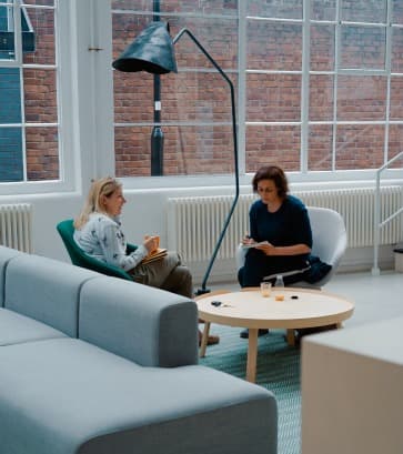 Company team collaboration in office